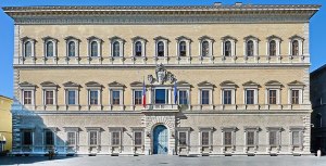 a group of people in front of a large building with Palazzo Farnese in the background