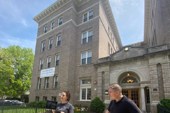 Guide Carolyn off of U Street