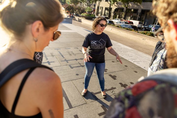 a woman standing on a beach