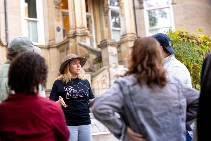 a group of people standing in front of a building