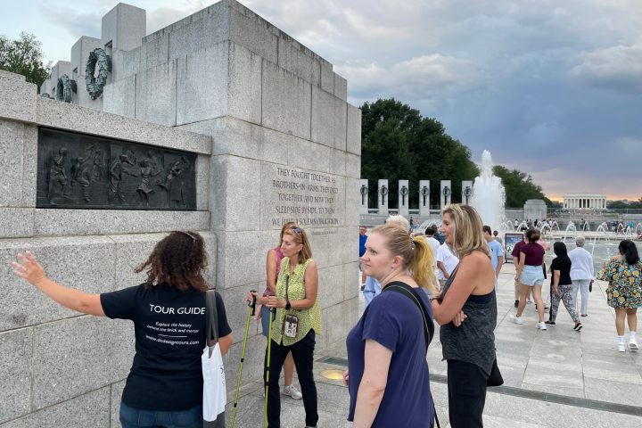 a group of people standing in front of a building