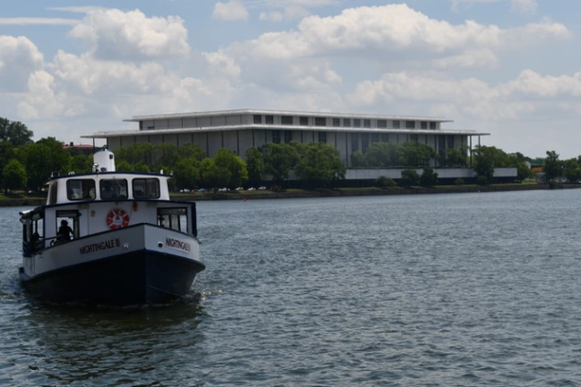 a boat traveling across a large body of water