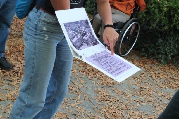 a woman sitting on a bench